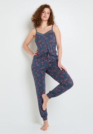 Pigiama navy a motivo floreale, composto da una canotta aderente con spalline sottili e pantaloni elasticizzati con polsini alle caviglie.