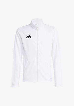 Veste blanche zippée en polyester lisse. Comprend un col montant, deux poches latérales, et un logo Adidas noir sur la poitrine gauche.