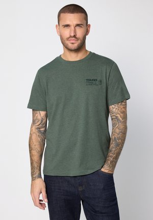 T-shirt med print - grün