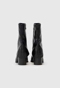 Marco Tozzi Bottines compensées - black