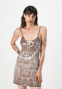 Brown mini dress with thin straps, featuring a silver graphic design and varying textures. Soft fabric with a smooth sheen and intricate patterns.