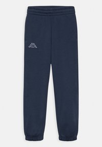 Tummansinisten collegehousujen joustava vyötärö ja hihansuut. Ylävasemmalla puolella on huomaamaton valkoinen logo. Valmistettu pehmeästä kankaasta.