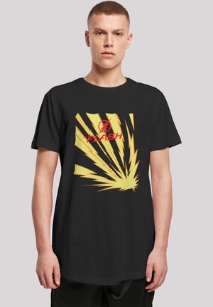 Musthave mustaari T-särk, millel on erksav kollane koomiksistiilis grafika, teravate joontega ja tekst "THE FLASH" punase värviga, valmistatud puuvillakangast.