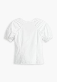 Blusa bianca a maniche corte con maniche a sbuffo e polsini con bottoni, caratterizzata da un design semplice e pulito e un collo rotondo.