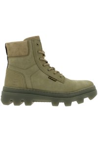 Botte haute vert olive avec semelle robuste, lacets à l'avant, col rembourré et petite étiquette logo G-Star sur le côté.