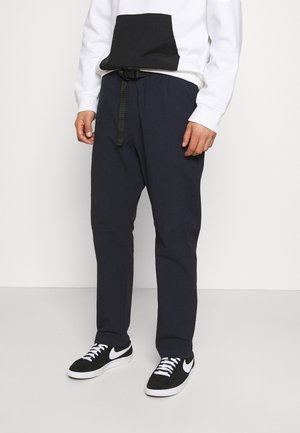 Spodnie materiałowe