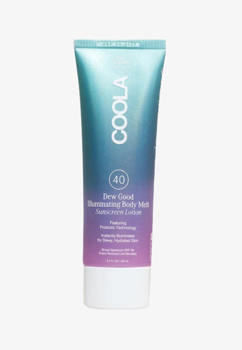 Coola Dew Good Illuminating Body Melt in a blue to purple gradient tube. Contains SPF 40, 3.4 fl oz, features probiotic technology.