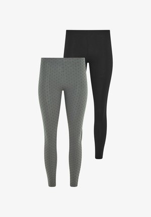 To par leggings i fuld længde, en ensfarvet sort og en grå med små sorte polkaprikker, vist forfra på hvid baggrund.