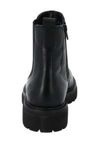 Czarne skórzane botki za kostkę z zamkiem błyskawicznym, teksturowanym wierzchem, okrągłym noskiem i grubą czarną gumową podeszwą dla lepszej przyczepności.