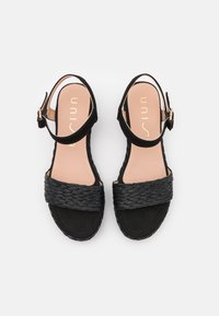 Unisa Sandali con plateau - black