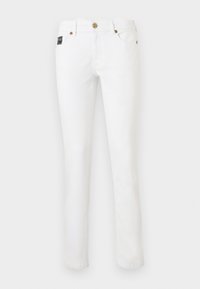 Λευκά τζιν με ίσια γραμμή, με χρυσά κουμπιά και τρουκ, μπροστινές τσέπες και ένα μικρό μαύρο ετικέτα με το λογότυπο στην δεξιά τσέπη.