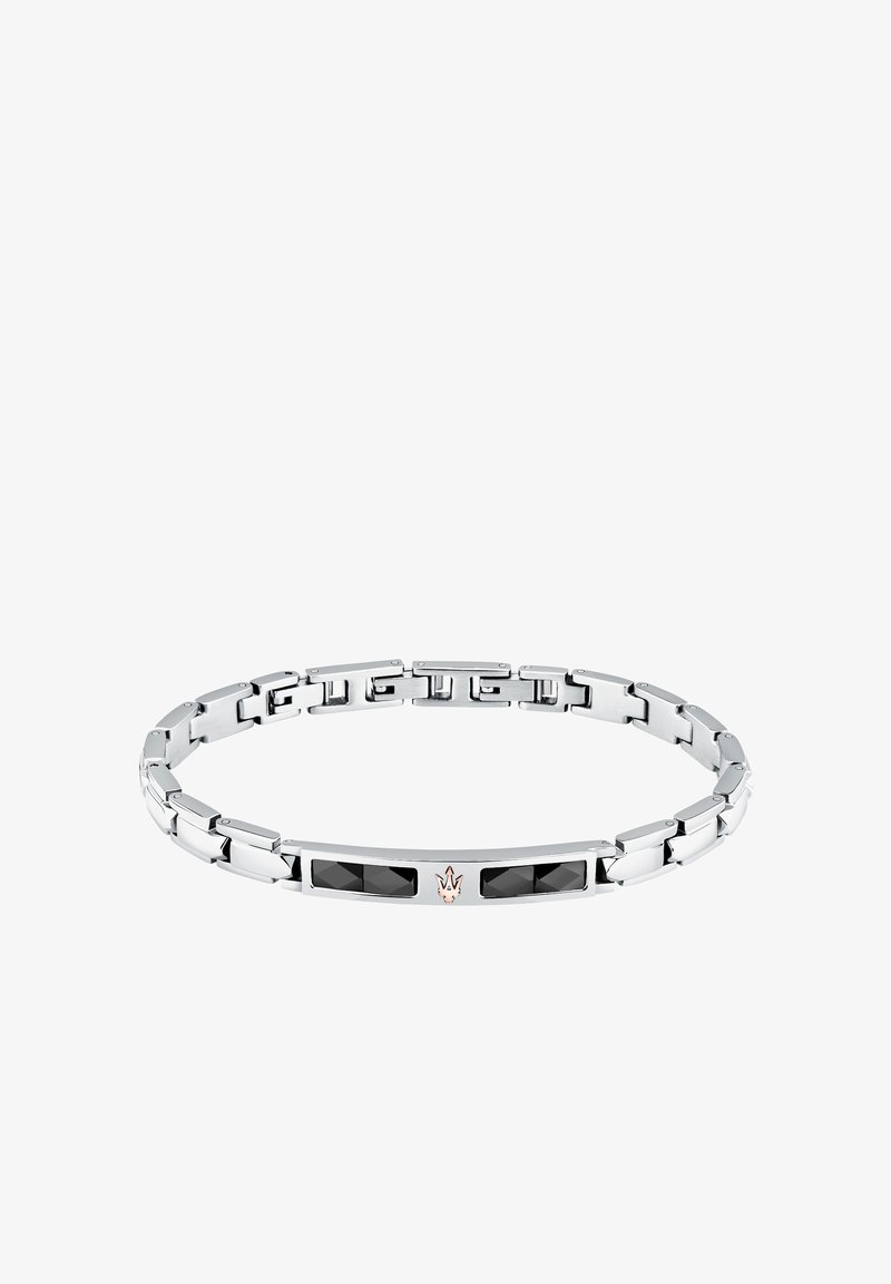 Silverarmband med länkade segment, med två rektangulära svarta stenar och en liten accent i roséguld i mitten. Slät, glänsande yta.