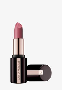 Rossetto in un colore rosa polveroso opaco, con un elegante tubetto nero con dettagli in oro rosa e un logo scolpito sulla punta del rossetto.