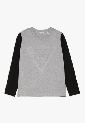 Langarmshirt mit grauer Vorderseite und schwarzen Ärmeln, mit einem dezenten, geprägten dreieckigen Guess-Logo auf der Brust.