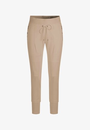 Beige slim-fit jogger pants with drawstring waist and zippered side pockets, designed for casual wear.