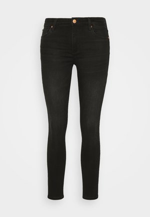 Vaqueros skinny negros de denim, con un diseño ajustado, estilo de cinco bolsillos, cierre de botón de latón y detalles de costura.