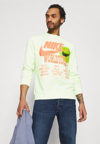 Nike Sportswear Top s dlhým rukávom - liquid lime