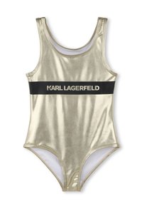 Costume da bagno intero in oro metallico con una fascia nera con il testo "KARL LAGERFELD". Texture liscia, design sportivo e scollatura rotonda.