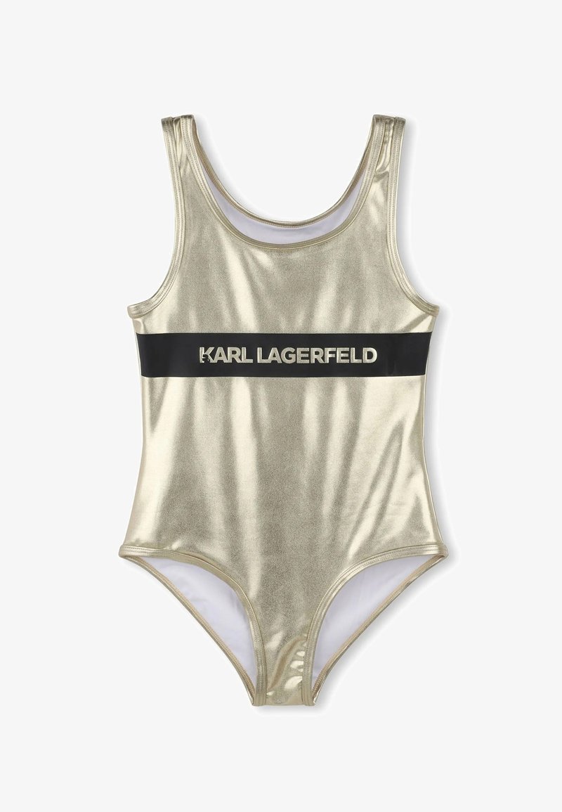 Maillot de bain une pièce doré métallique avec une bande noire portant le texte "KARL LAGERFELD". Texture lisse, design sportif et décolleté rond.