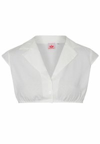 Blouse blanche courte avec un col, des manches courtes, une fermeture à boutons et un motif en relief à pois.