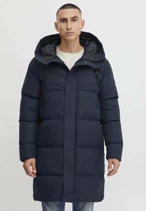 Navy blue padded long coat with a hood, featuring zippered pockets, a front closure, and horizontal stitching for insulation.