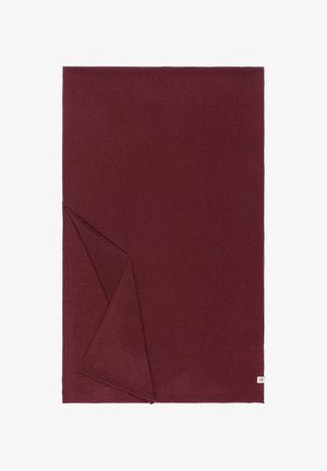 Burgundy blanket made of soft fabric, featuring a folded corner, clean edges, and a small label on one side. Smooth texture, solid color.