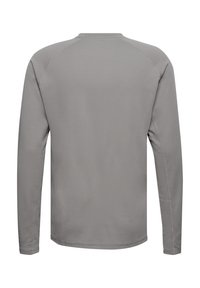 Grå träningsshirt med lång ärm i ett texturerat, andningsbart tyg med rund halsringning och raglanärmar.