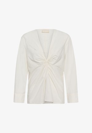 Fehér hosszú ujjú blúz mély V-nyakkivágással és elöl középen összegyűrt csavarodás részlettel, laza szabás, enyhén bővülő szegéllyel.