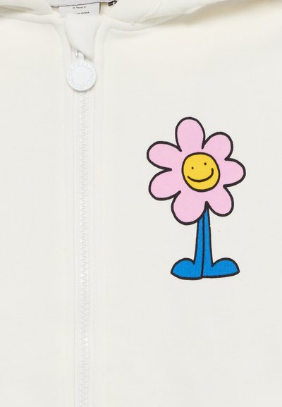 White zip-up hoodie featuring a pink flower graphic with a smiling yellow face, blue stem, and blue shoes. Soft fabric with smooth texture.