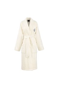 Accappatoio color crema realizzato in tessuto testurizzato, con colletto a scialle, due tasche frontali, una cintura in vita e un piccolo logo.
