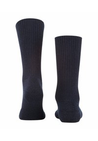 Calze nere a costine con design semplice, dotate di talloni e punte rinforzate, realizzate in tessuto morbido per comfort e durata.