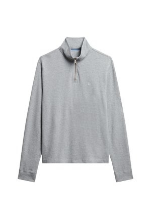 Lys grå pullover, lavet af blødt stof, med en halv lynlås og en stående krave. Inkluderer et lille logo på brystområdet.