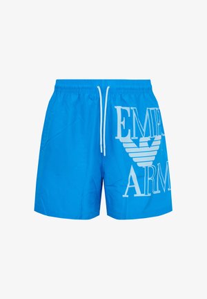 Pantaloncini da bagno di un brillante blu con coulisse bianca e grande logo "Emporio Armani" bianco sulla gamba destra.