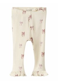 Geribbelde crèmekleurige legging met roze strikpatronen en gerimpelde manchetten. Gemaakt van zachte stof, geschikt voor casual gebruik.