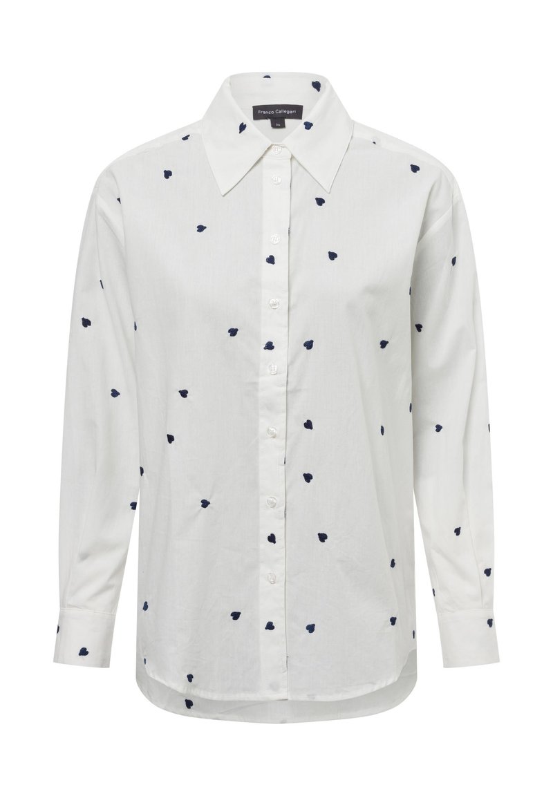 White long-sleeve shirt with a collared neckline, featuring navy blue heart-shaped embroidery motifs throughout and button closure.