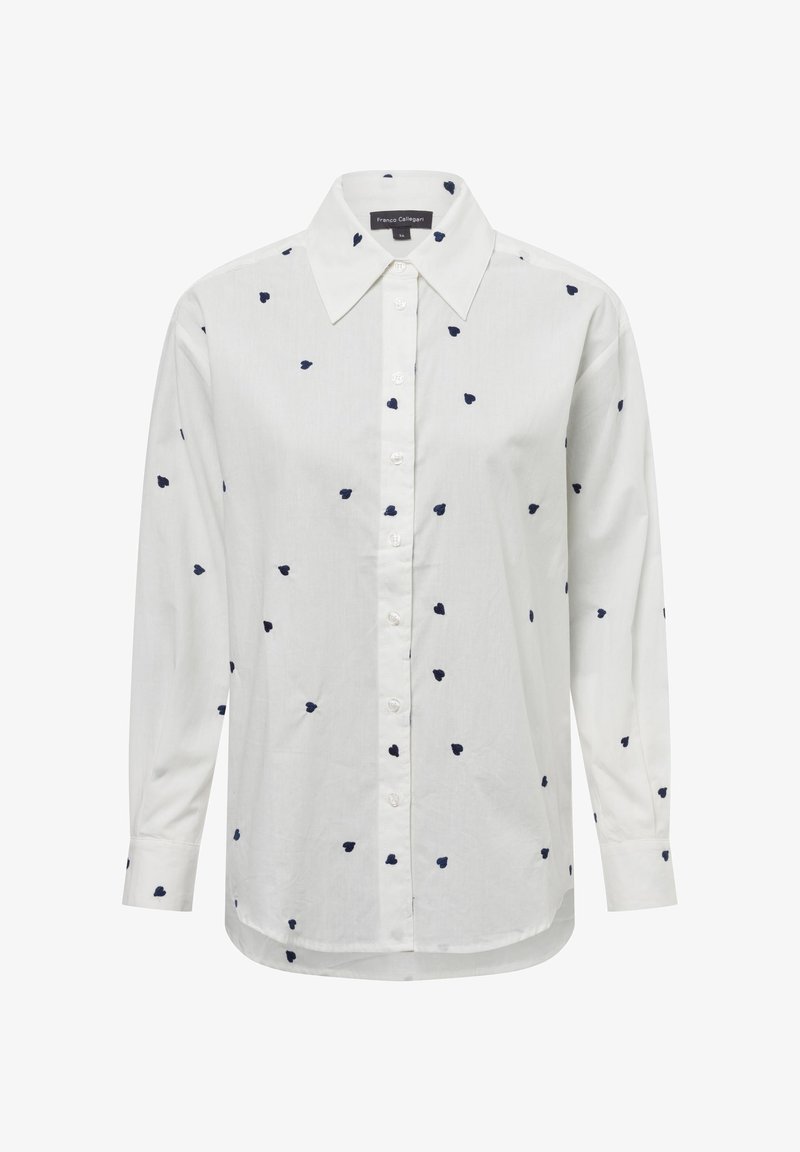White long-sleeve shirt with a collared neckline, featuring navy blue heart-shaped embroidery motifs throughout and button closure.