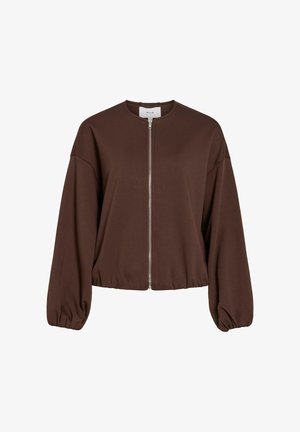 Veste marron à fermeture éclair avec un col arrondi et des manches surdimensionnées et bouffantes. Confectionnée dans un tissu doux, elle présente un ourlet côtelé à la taille.