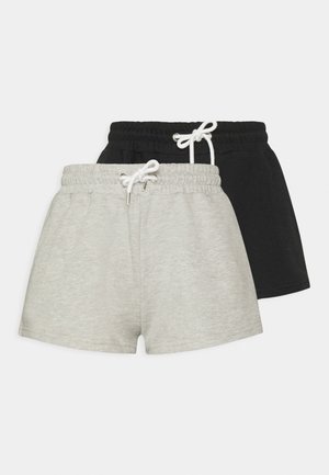 Pantaloni scurți în gri deschis și negru. Material moale, talie elastică cu șnur ajustabil, croială scurtă și fără buzunare.