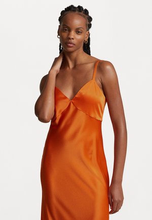 Satin orange dress with a v-neckline, thin straps, and an A-line silhouette, featuring a soft texture and seamless design.