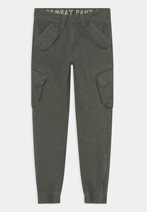 Cargo pants in olive green, featuring multiple side pockets, curved seam details, and elasticated cuffs for a tapered fit.