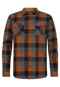 Koszula flanelowa w czarno-pomarańczową kratę, zapinana na guziki, z dwoma kieszeniami na piersiach, wykonana z miękkiego, teksturowanego materiału.