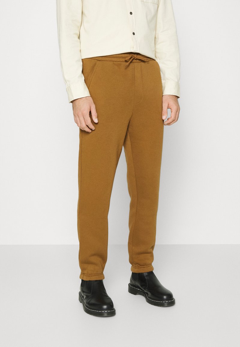 Jack & Jones JJIKANE JJBRINK PANTS - Calças de fato de treino - desert palm