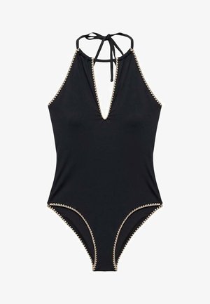 Musta kokopuku uimapuku, jossa on syvä V-pääntie, kahlehitse sidontanauhat ja kultareunaiset kaarevat yksityiskohdat aukkojen ja saumoihin.
