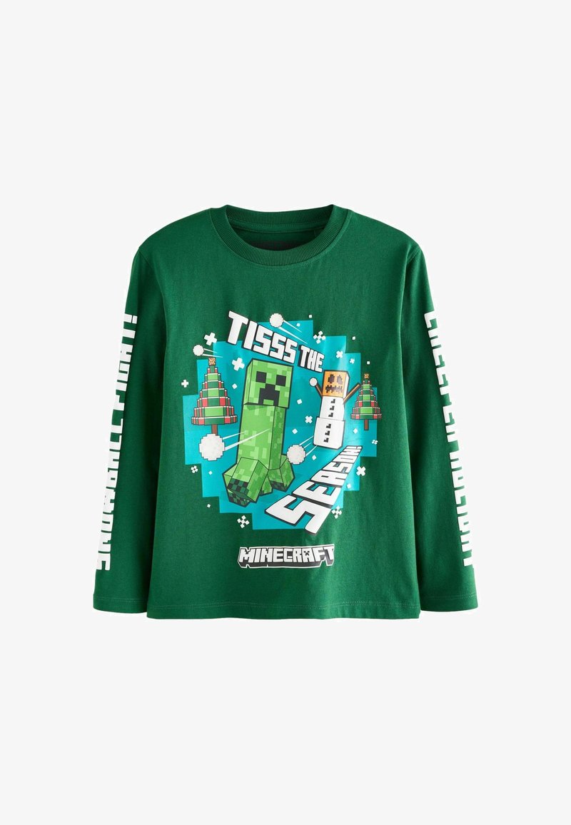 Grünes Langarm-T-Shirt aus Baumwolle. Verfügt über eine pixelierte Charaktergrafik mit dem Text „Tisss the Season“ und Schneeflocken.