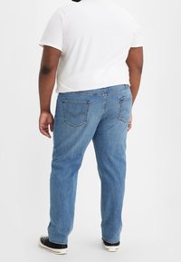 Levi's® Plus Jeans Tapered Fit - blue denim