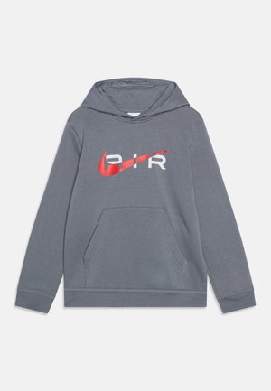 Harmaa huppari etutaskulla, jossa on punainen Nike-swoosh ja valkoinen "AIR"-logo rinnassa.