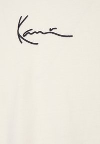 Karl Kani SMALL SIGNATURE TEE UNISEX - Camiseta básica - cream