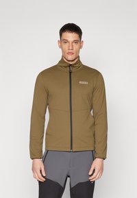 Olive green zip-up jacket with a high collar, made of smooth fabric, featuring a front logo and contrasting black zipper trim.