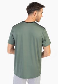 Spyder CREW - Camiseta deportiva - green
