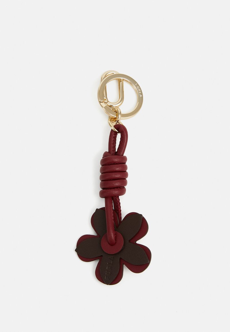 Breloc din piele cu un design de floare roșie închisă, având un bucla de piele înfășurată și un inel pentru chei din metal de culoare aurie pentru atașare.